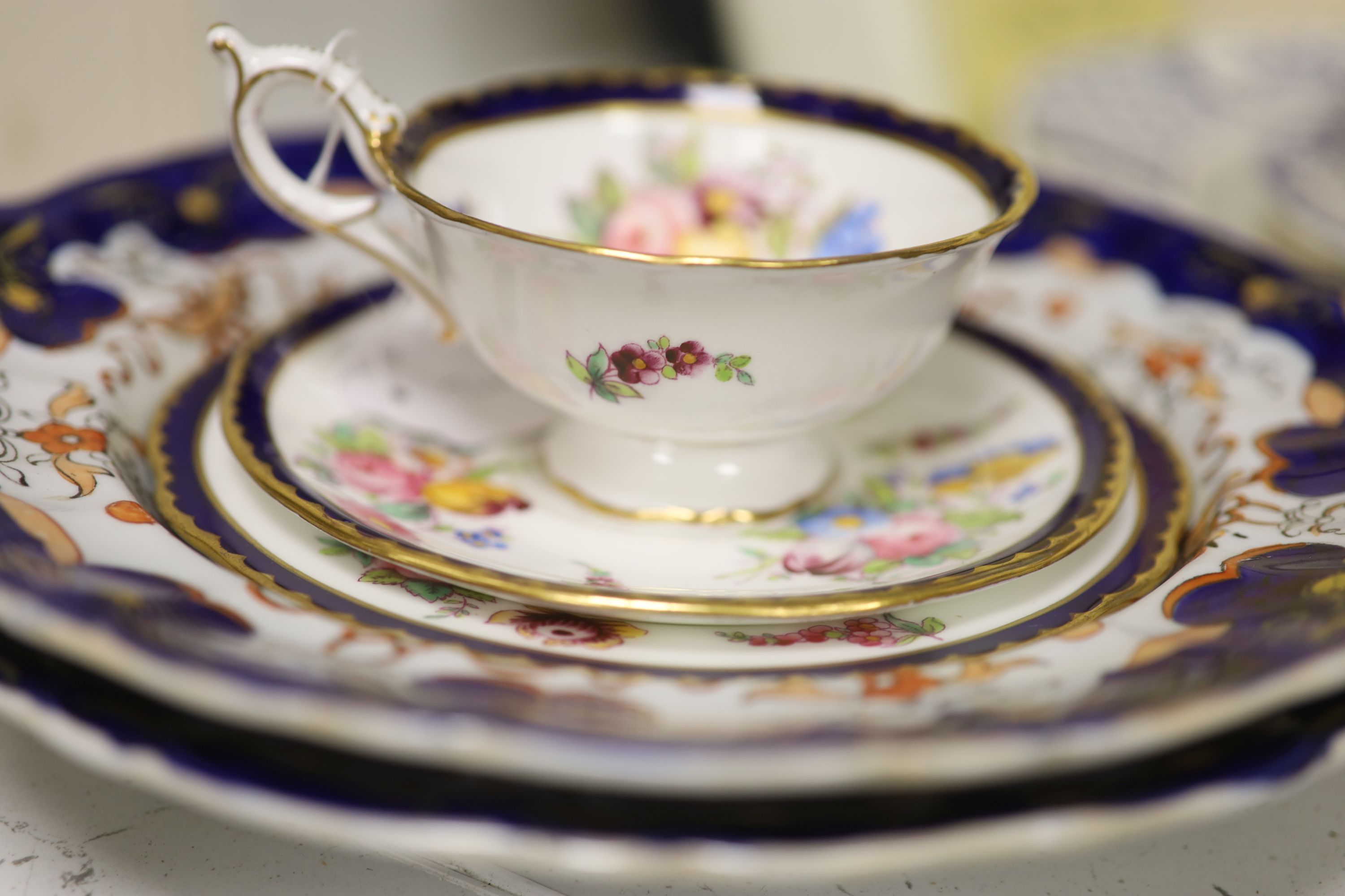 A Coalport cobalt blue dish with painted reserve of Kilchurn, heightened in gilt and sundry ceramics,